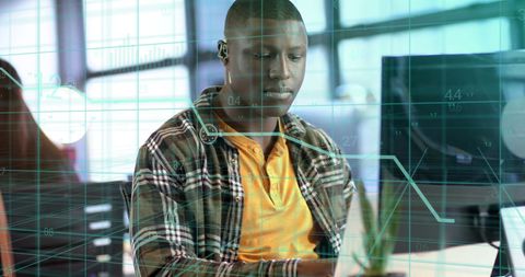 Financial data analysis by analyst in modern office setting