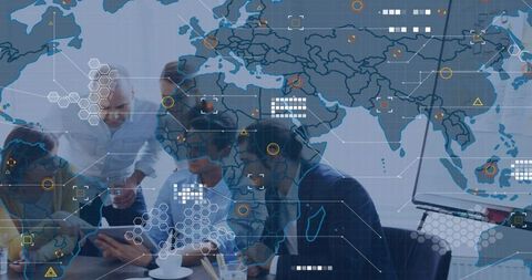 Business Team Collaborating Over Tablet With Global Data Overlay for Strategy and Analytics