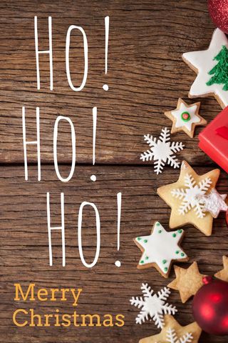 Festive christmas cookies and decor with holiday greeting