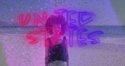 Woman on Beach with Neon United States Text Overlay