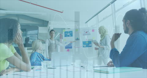 Diverse Team Collaborating in Modern Office with Data Animation Overlay