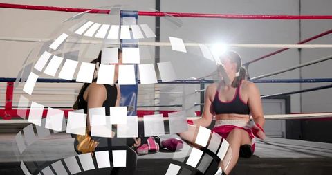 Female boxers sitting and talking in ring resting after sparring with mosaic overlay gym