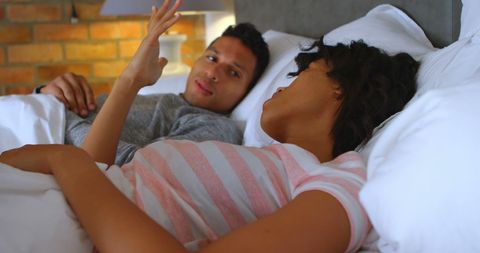 Couple Relaxing in Bed During Morning Routine - Download Free Stock Images Pikwizard.com