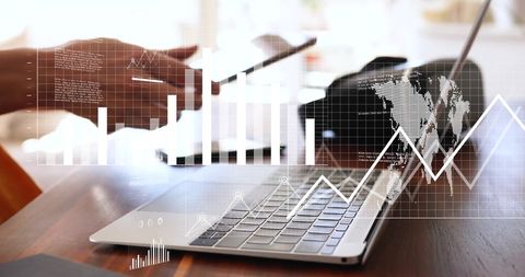 Businesswoman Navigating Financial Data Analytics on Tablet