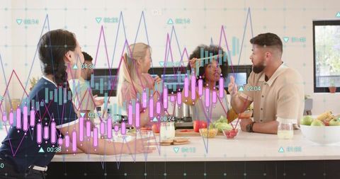 Multicultural team discussing healthy eating and data analytics around kitchen island