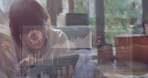 Young Woman Analyzing Data Technology Interface on Tablet