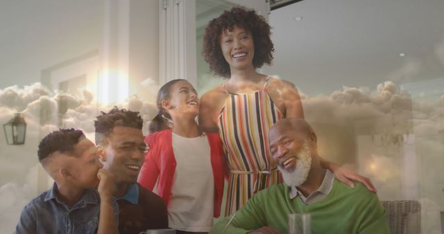 Multi-generational family sharing a happy moment at home. Suitable for themes related to family bonds, togetherness, love, and home comfort. Ideal for ads, family-oriented projects, and lifestyle content.