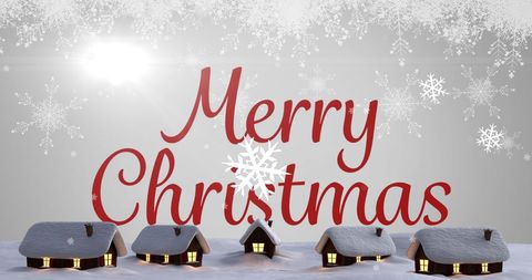Merry Christmas Greeting Over Snowy Village Scene