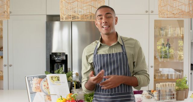 Young Chef in Modern Kitchen with Fresh Ingredients Prepares Meal - Download Free Stock Images Pikwizard.com