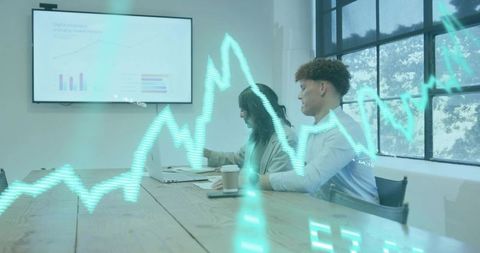 Collaborating team analyzing financial data on laptop and screen with teal chart overlay