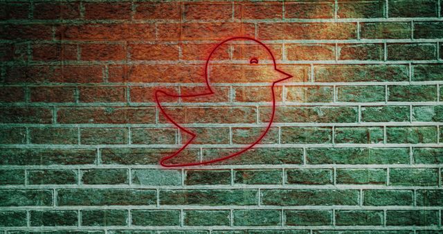 Red Digital Bird Icon on Brick Wall Representing Social Media - Download Free Stock Images Pikwizard.com