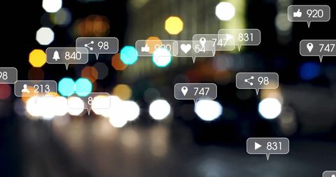 Social media icons superimposed on blurry urban street