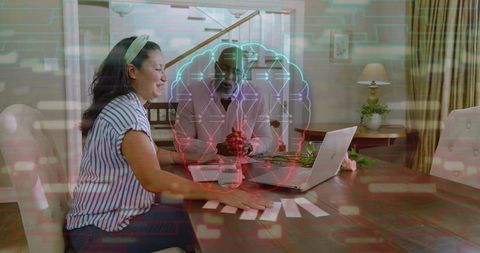 Discussing ai brain hologram while collaborating from home with laptop and index cards