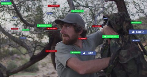 Rugged Adventurer Among Social Media Icons in Wilderness