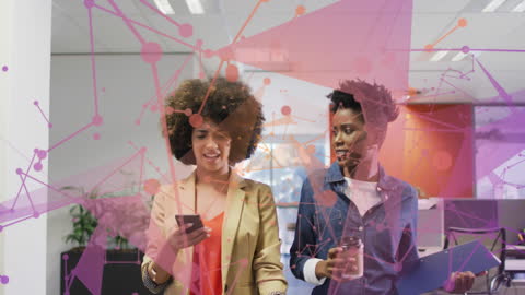 Businesswomen Collaborating with Digital Network Overlay