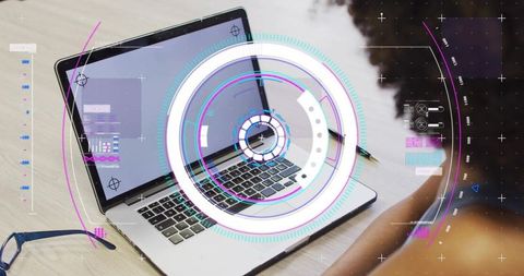 Holographic HUD Interface Over Laptop Showing Futuristic Workspace and Augmented UX Design