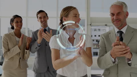 Happy Business Team Clapping in Modern Office with Holographic Interface
