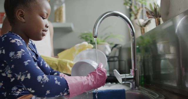 Young Girl Washing Dishes in Kitchen Sink - Download Free Stock Images Pikwizard.com