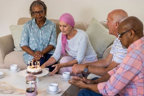 Diverse Elders Enjoying Warm Birthday Celebration at Home