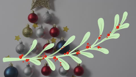 Christmas Baubles with Festive Decorations on Grey Background