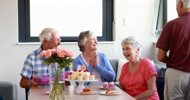 Senior Woman Receiving Surprise Gift at Birthday Celebration - Download Free Stock Images Pikwizard.com