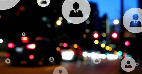 Profile icons superimposed on night city street with traffic lights