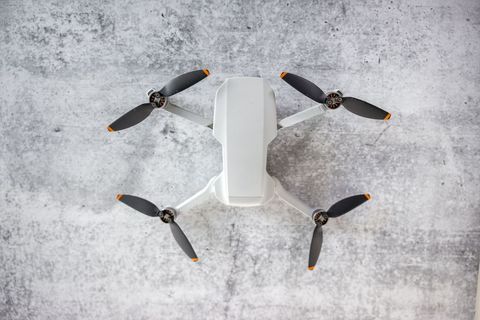Technology aerial drone on concrete surface captured from above