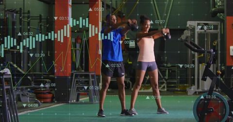 Active Fitness Couple Kettlebell Training in Gym with Overlaid Graphic Data
