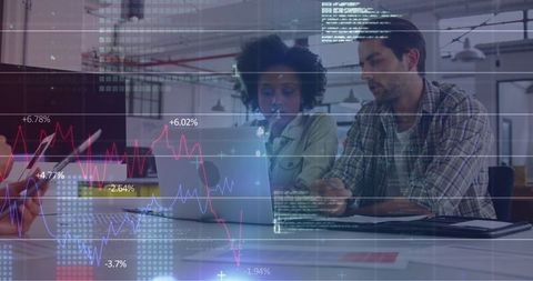 Team strategic analysis of financial data against graph backdrop