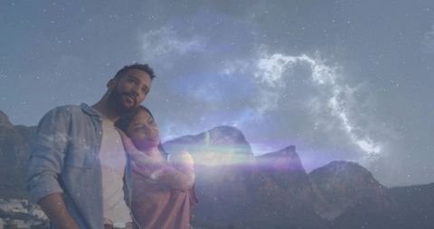 Gazing couple under nebula sky on mountain overlook, romantic starry night with aurora glow