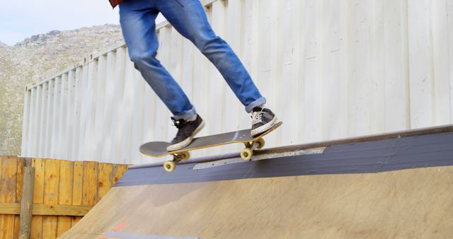 Young Skateboarder Performing Tricks at Skatepark with Wooden Ramp - Download Free Stock Images Pikwizard.com