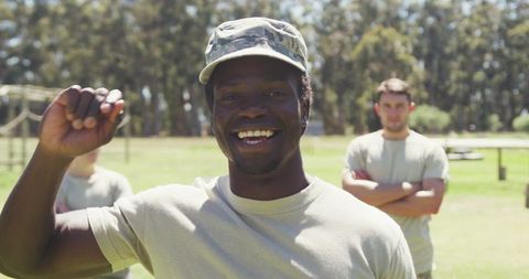 Happy Soldier Celebrating Victory on Outdoor Obstacle Course - Download Free Stock Images Pikwizard.com