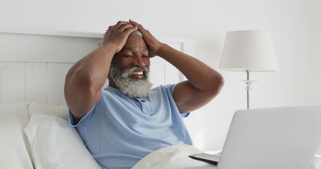 Senior African American Man Frustrated with Laptop in Bedroom - Download Free Stock Images Pikwizard.com