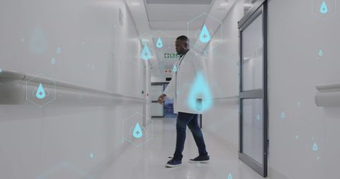 African American Doctor in Hospital Corridor with Digital Health Icons - Download Free Stock Images Pikwizard.com