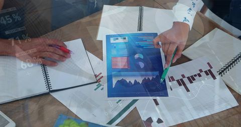 Business Professionals Analyzing Data and Charts