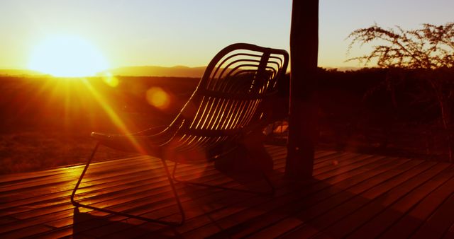 Sunset View from Wooden Patio with Comfortable Chair - Download Free Stock Images Pikwizard.com