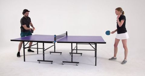 Diverse opponents in energetic table tennis match