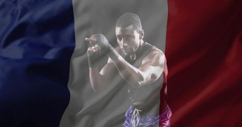 Confident Boxer with French Flag Overlay Background