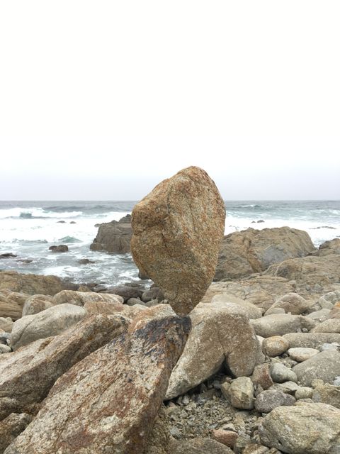 Balanced Rock Formation on Rocky Beach - Download Free Stock Photos Pikwizard.com