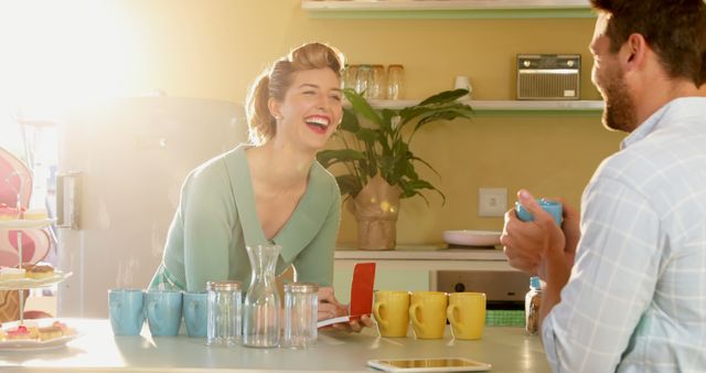 Couple Enjoying Coffee and Laughter in Bright Kitchen - Download Free Stock Images Pikwizard.com