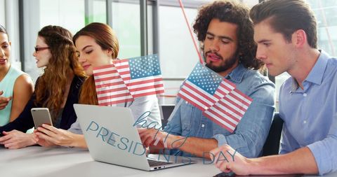 Team celebrating with usa flags for presidents day