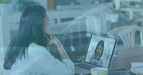 Businesswomen Engaging in Remote Work, Video Call Discussion