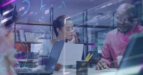 Senior Man and Young Woman Collaborating in Modern Office with Technology Overlay