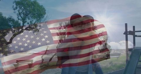 Romantic piggyback ride with american flag overlay in sunlit park