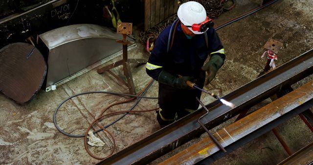 Industrial Worker Welding Metal with Precision in Factory - Download Free Stock Images Pikwizard.com