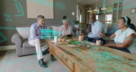 Multigenerational adults reviewing documents in living room with tech collaboration overlay