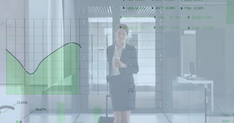 Businesswoman Walking Through High-Tech Office Illuminated by Data Displays