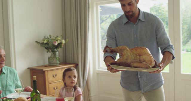 Family Celebrating Over Delicious Roasted Turkey at Dinner Table - Download Free Stock Images Pikwizard.com