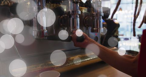 Barista making coffee in vibrant cafe setting