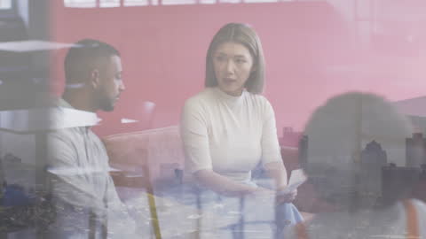 Diverse Professionals Collaborating Through Digital Landscape